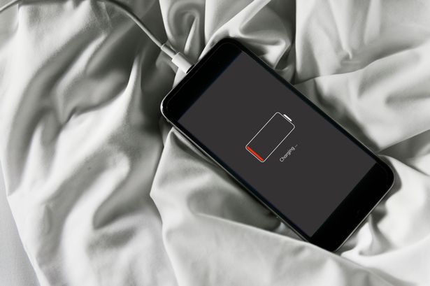 Apple warns iPhone users about sleeping next to their phone while it charges